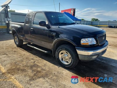 Czwarte zdjęcie samochodu z boku: 2000 FORD F150 VIN:1FTRX08L6YKB35548 - miniatura