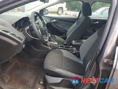 Zdjęcie 7 z 12 samochodu: 2014 FORD FOCUS SE VIN:1FADP3F21EL446855 - miniatura