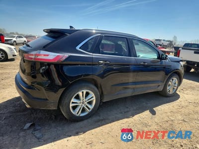Trzecie zdjęcie samochodu z tyłu: 2019 FORD EDGE SEL VIN:2FMPK4J98KBB76935 - miniatura