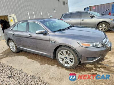 Czwarte zdjęcie samochodu z boku: 2011 FORD TAURUS LIMITED VIN:1FAHP2FW1BG126969 - miniatura