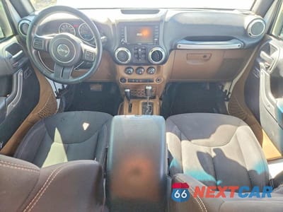Zdjęcie 8 z 13 samochodu: 2015 JEEP WRANGLER UNLIMITED SAHARA VIN:1C4BJWEG0FL516400 - miniatura