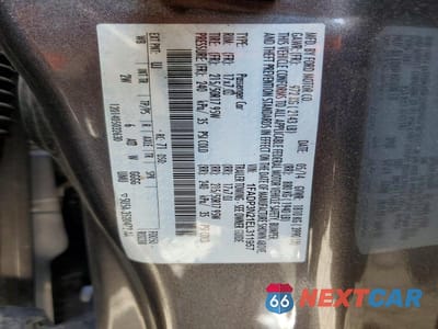 Zdjęcie 13 z 13 samochodu: 2014 FORD FOCUS TITANIUM VIN:1FADP3N21EL311957 - miniatura