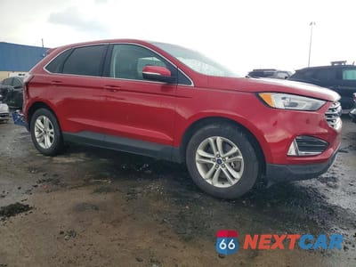 Czwarte zdjęcie samochodu z boku: 2020 FORD EDGE SEL VIN:2FMPK4J97LBA59557 - miniatura
