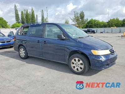 Czwarte zdjęcie samochodu z boku: 2004 HONDA ODYSSEY EXL VIN:5FNRL18914B020899 - miniatura