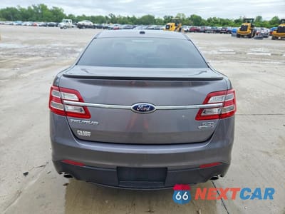 Zdjęcie 6 z 12 samochodu: 2014 FORD TAURUS SEL VIN:1FAHP2E89EG144871 - miniatura