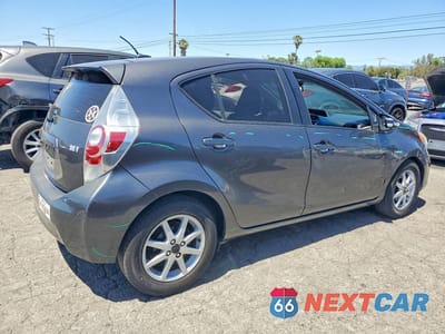 Trzecie zdjęcie samochodu z tyłu: 2014 TOYOTA PRIUS C THREE VIN:JTDKDTB37E1072773 - miniatura