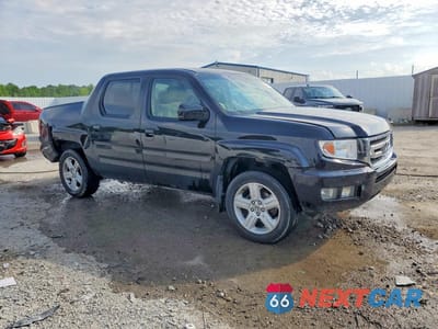 Czwarte zdjęcie samochodu z boku: 2010 HONDA RIDGELINE RTL VIN:5FPYK1F52AB011694 - miniatura