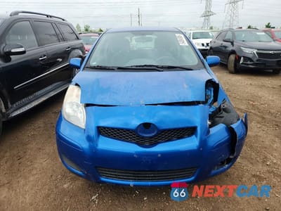 Piąte zdjęcie samochodu w środku: 2011 TOYOTA YARIS BASE VIN:JTDJT4K39B5335256 - miniatura