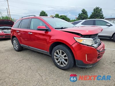Czwarte zdjęcie samochodu z boku: 2011 FORD EDGE SEL VIN:2FMDK3JC8BBB29512 - miniatura