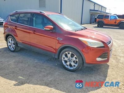Czwarte zdjęcie samochodu z boku: 2016 FORD ESCAPE TITANIUM VIN:1FMCU0JX3GUB97435 - miniatura