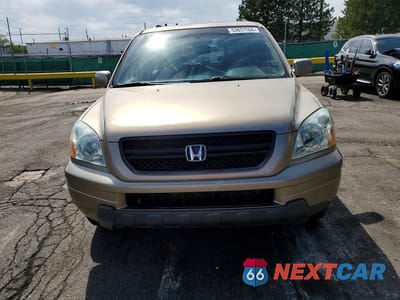 Piąte zdjęcie samochodu w środku: 2005 HONDA PILOT EXL VIN:2HKYF18705H529046 - miniatura