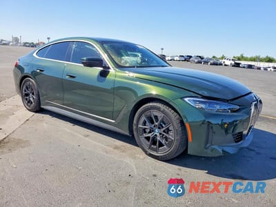 Czwarte zdjęcie samochodu z boku: 2024 BMW I4 EDRIVE 35 VIN:WBY43AW08RFR99126 - miniatura