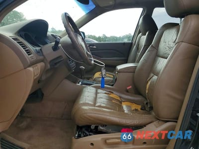 Zdjęcie 7 z 13 samochodu: 2004 ACURA MDX VIN:2HNYD18224H559595 - miniatura