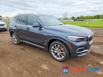 Czwarte zdjęcie samochodu z boku: 2022 BMW X5 XDRIVE40I VIN:5UXCR6C06N9K67825 - miniatura