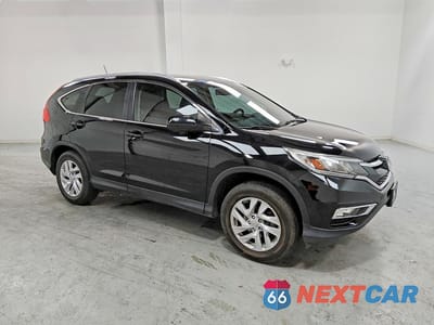 Czwarte zdjęcie samochodu z boku: 2015 HONDA CR-V EXL VIN:2HKRM4H71FH687070 - miniatura