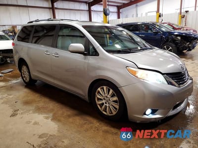 Czwarte zdjęcie samochodu z boku: 2011 TOYOTA SIENNA XLE 7-PASSENGER VIN:5TDDK3DC3BS010555 - miniatura