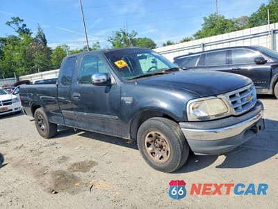Czwarte zdjęcie samochodu z boku: 1999 FORD F250 VIN:1FTRX27L9XNB18155 - miniatura