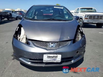 Piąte zdjęcie samochodu w środku: 2012 HONDA FIT VIN:JHMGE8H3XCC000473 - miniatura