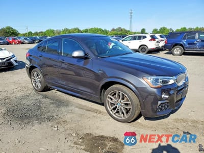 Czwarte zdjęcie samochodu z boku: 2018 BMW X4 XDRIVEM40I VIN:5UXXW7C51J0W64787 - miniatura