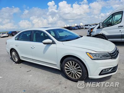 Czwarte zdjęcie samochodu z boku: 2016 VOLKSWAGEN PASSAT SE VIN:1VWBT7A35GC027928 - miniatura
