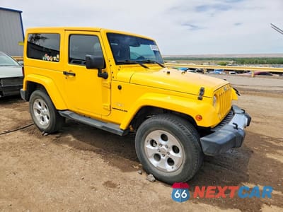 Czwarte zdjęcie samochodu z boku: 2015 JEEP WRANGLER SAHARA VIN:1C4AJWBG5FL725356 - miniatura