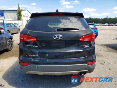 Zdjęcie 6 z 13 samochodu: 2014 HYUNDAI SANTA FE SPORT 2.0T VIN:5XYZUDLA5EG210697 - miniatura