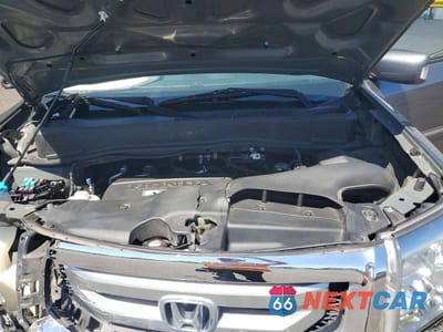 Zdjęcie 11 z 12 samochodu: 2010 HONDA PILOT TOURING VIN:5FNYF4H82AB012334 - miniatura