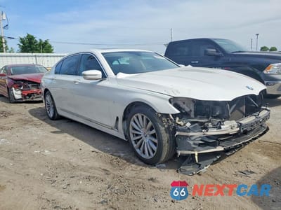 Czwarte zdjęcie samochodu z boku: 2016 BMW 740 I VIN:WBA7E2C50GG503836 - miniatura