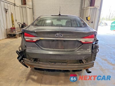 Zdjęcie 6 z 12 samochodu: 2017 FORD FUSION SE HYBRID VIN:3FA6P0LU4HR250671 - miniatura