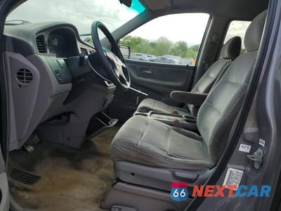 Zdjęcie 7 z 14 samochodu: 2000 HONDA ODYSSEY LX VIN:2HKRL1857YH596386 - miniatura