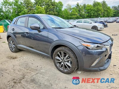 Czwarte zdjęcie samochodu z boku: 2017 MAZDA CX-3 TOURING VIN:JM1DKFC75H0178344 - miniatura