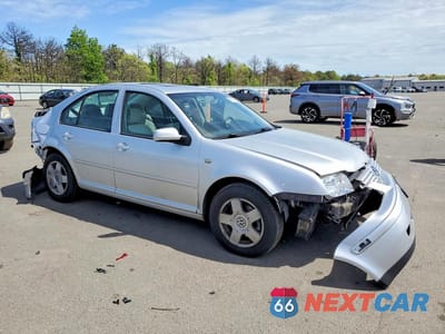 Czwarte zdjęcie samochodu z boku: 2002 VOLKSWAGEN JETTA GLS TDI VIN:3VWSP69M32M045279 - miniatura