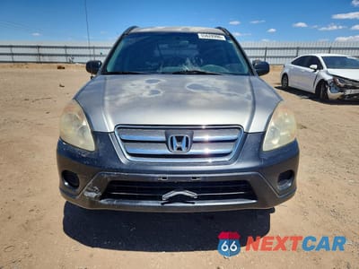 Piąte zdjęcie samochodu w środku: 2005 HONDA CR-V LX VIN:JHLRD68555C013835 - miniatura