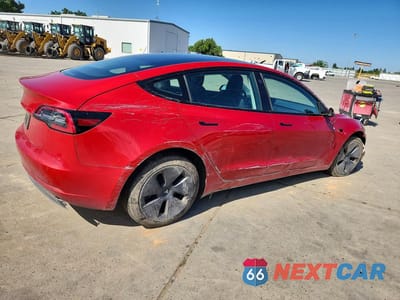 Trzecie zdjęcie samochodu z tyłu: 2022 TESLA MODEL 3 VIN:5YJ3E1EA1NF345939 - miniatura