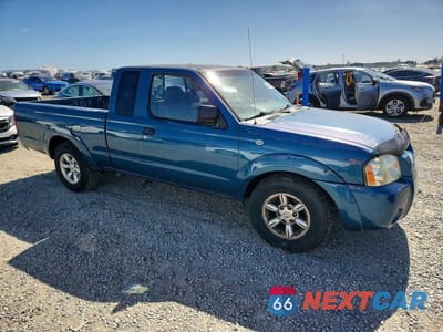 Czwarte zdjęcie samochodu z boku: 2001 NISSAN FRONTIER KING CAB XE VIN:1N6DD26S01C333502 - miniatura