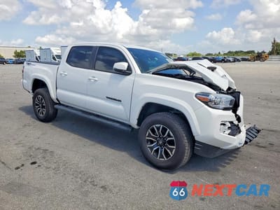 Czwarte zdjęcie samochodu z boku: 2023 TOYOTA TACOMA TRD SPORT VIN:3TMAZ5CNXPM207940 - miniatura