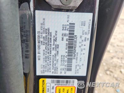 Zdjęcie 12 z 12 samochodu: 2014 FORD FUSION TITANIUM VIN:3FA6P0D94ER181339 - miniatura