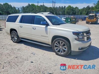 Czwarte zdjęcie samochodu z boku: 2015 CHEVROLET SUBURBAN K1500 LTZ VIN:1GNSKKKCXFR289552 - miniatura