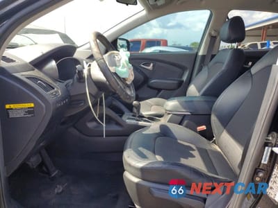Zdjęcie 7 z 13 samochodu: 2011 HYUNDAI TUCSON GLS VIN:KM8JUCAC3BU309472 - miniatura