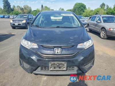 Piąte zdjęcie samochodu w środku: 2016 HONDA FIT LX VIN:JHMGK5H50GX003650 - miniatura