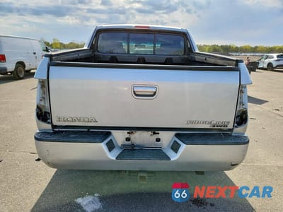 Zdjęcie 6 z 12 samochodu: 2006 HONDA RIDGELINE RTL VIN:2HJYK16536H574789 - miniatura