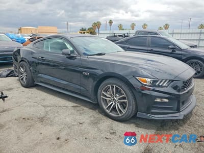 Czwarte zdjęcie samochodu z boku: 2015 FORD MUSTANG GT VIN:1FA6P8CF4F5314689 - miniatura