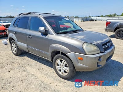 Czwarte zdjęcie samochodu z boku: 2007 HYUNDAI TUCSON SE VIN:KM8JN12D17U540127 - miniatura