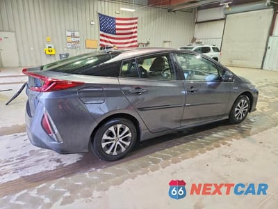 Trzecie zdjęcie samochodu z tyłu: 2022 TOYOTA PRIUS PRIME XLE VIN:JTDKAMFP2N3219050 - miniatura