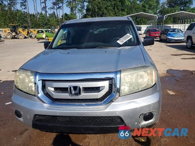 Piąte zdjęcie samochodu w środku: 2011 HONDA PILOT LX VIN:5FNYF3H20BB056744 - miniatura