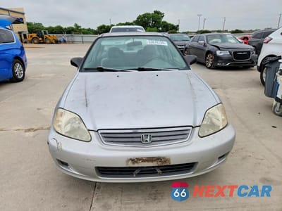Piąte zdjęcie samochodu w środku: 1999 HONDA CIVIC LX VIN:1HGEJ6672XL043291 - miniatura