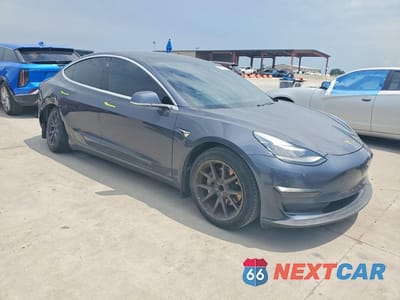 Czwarte zdjęcie samochodu z boku: 2020 TESLA MODEL 3 VIN:5YJ3E1EA3LF657841 - miniatura