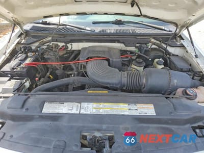 Zdjęcie 11 z 13 samochodu: 2000 FORD F150 VIN:1FTRX18L3YNA38893 - miniatura