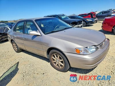 Czwarte zdjęcie samochodu z boku: 1999 TOYOTA COROLLA VE VIN:1NXBR12EXXZ238871 - miniatura