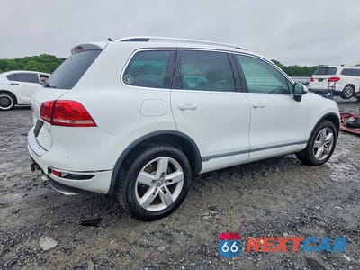 Trzecie zdjęcie samochodu z tyłu: 2014 VOLKSWAGEN TOUAREG V6 TDI VIN:WVGEP9BPXED008974 - miniatura